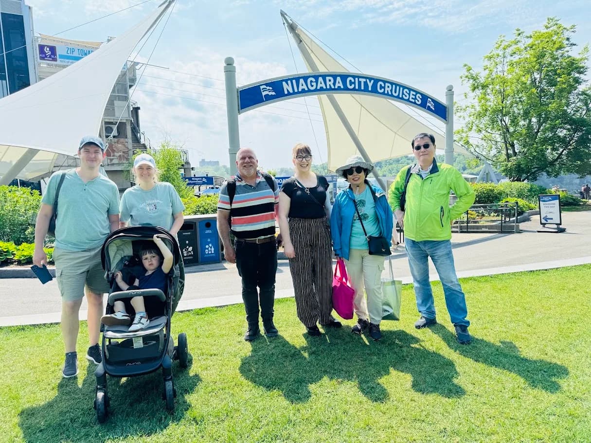 Family group gathered near the Niagara City Cruises entrance