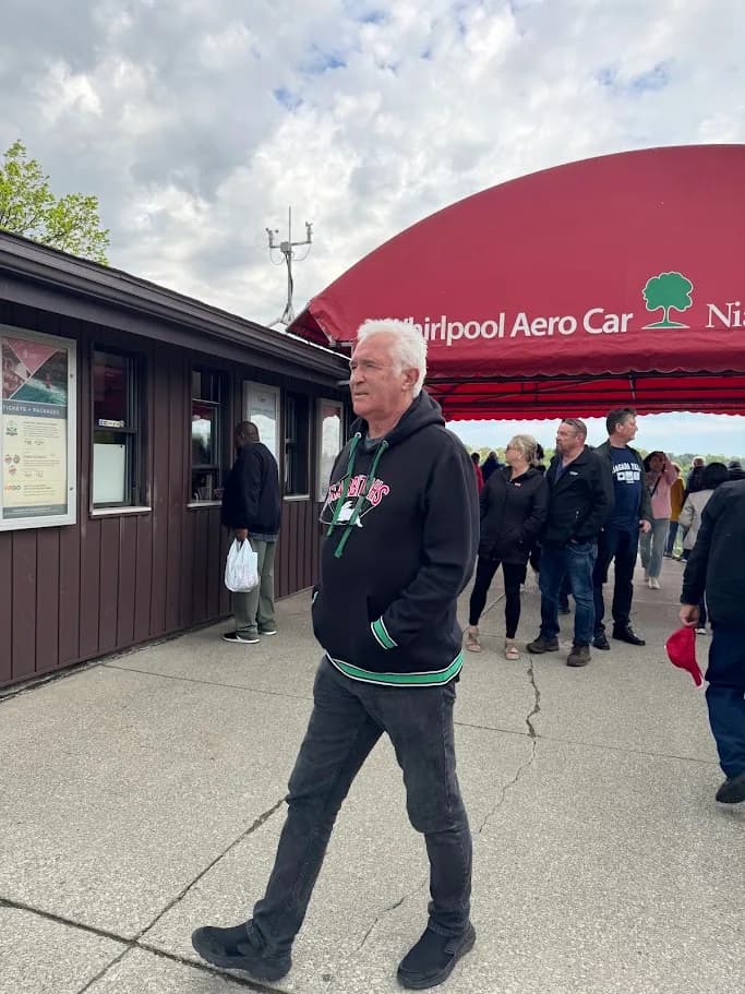 Guest standing near the Whirlpool Aero Car entrance