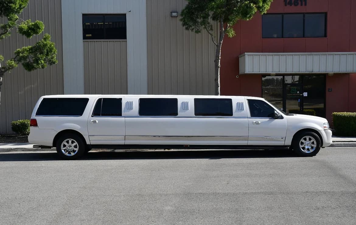 Long black stretch SUV limousine photographed outdoors