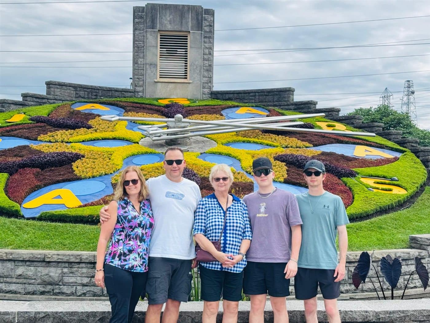 Family group posing together at the Niagara Parks Floral Clock