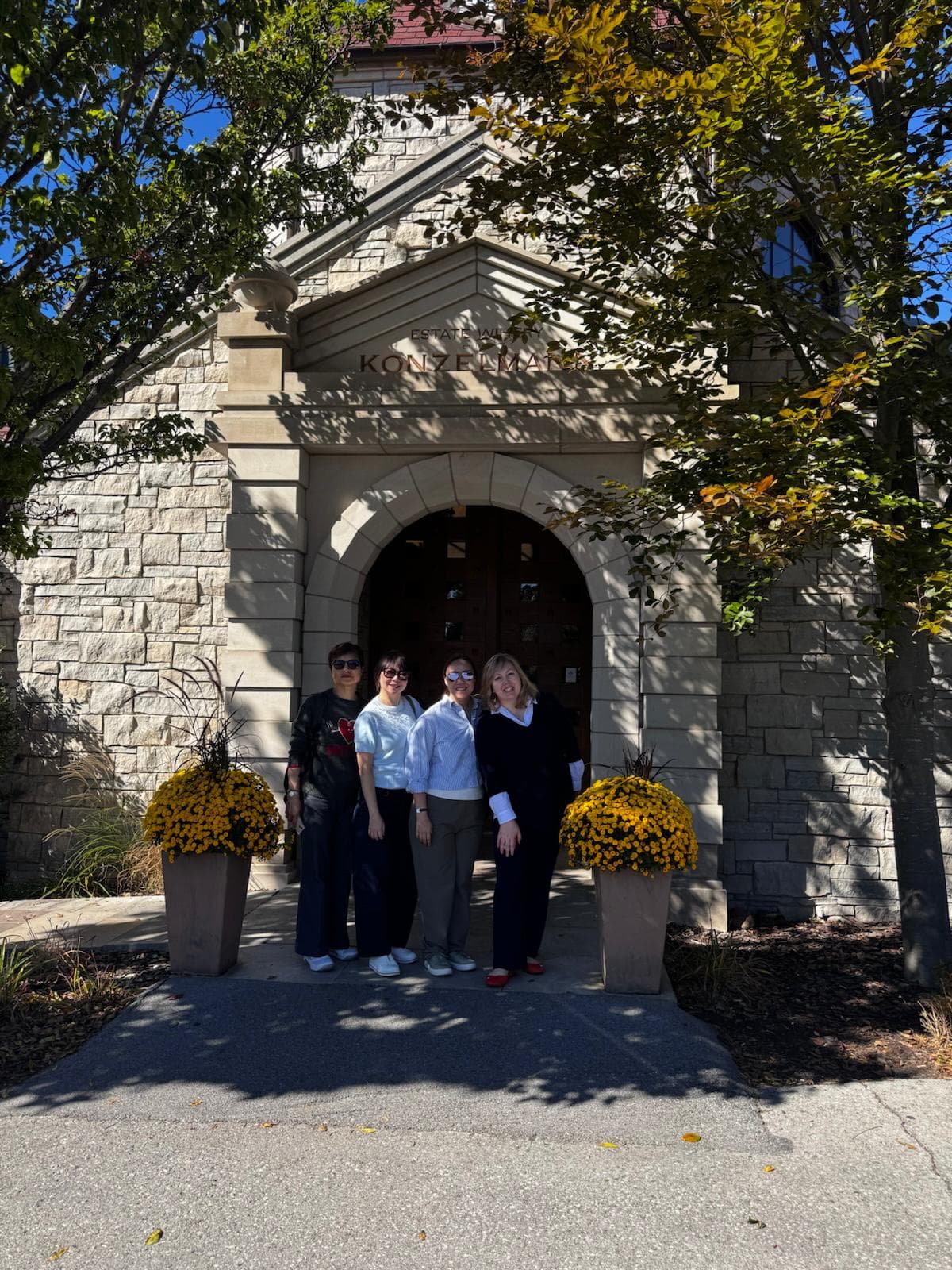 Private wine tour group standing outside Konzelmann Estate Winery in Niagara-on-the-Lake